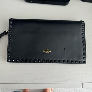 Rockstud leather clutch bag